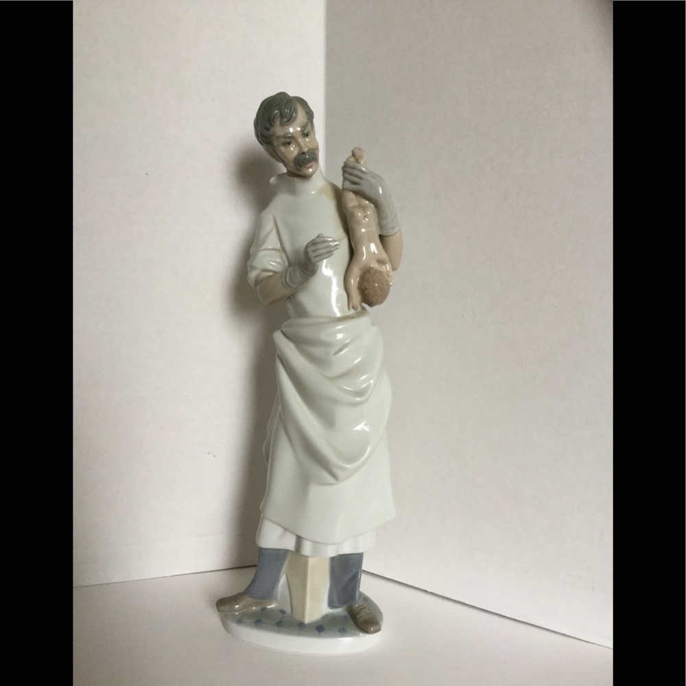 Lladro “Obstetrician” Doctor with Baby #4763